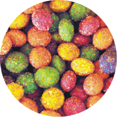 Un montón de coloridos ositos de goma en un círculo.