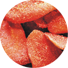 Un primer plano de ositos de goma rojos en un círculo.